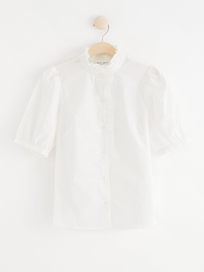 Blus med puffärm