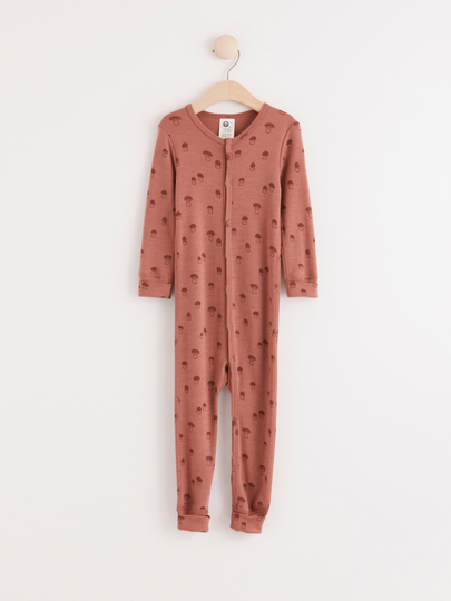 Onesie med svampar i merinoull